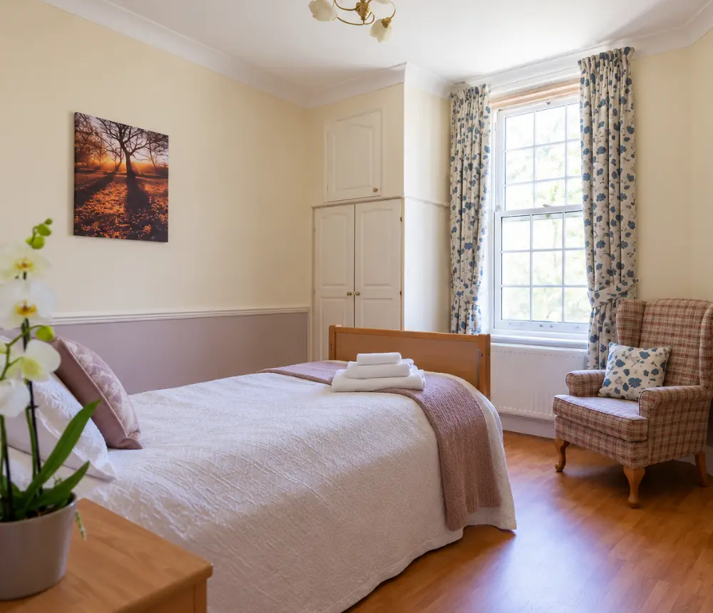 Comfortable bedroom at Aldringham Court care home
