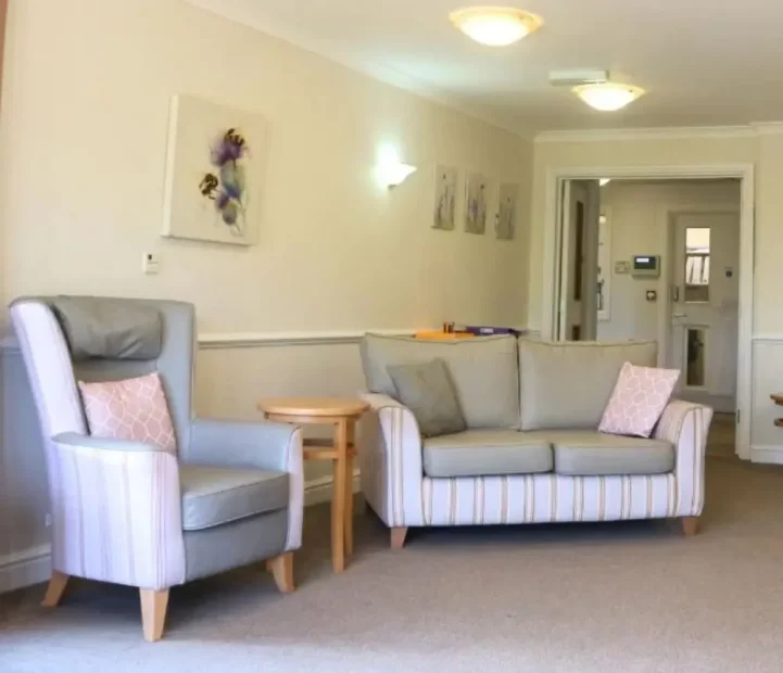Spacious communal lounge at Avon Lodge nursing home in Bristol