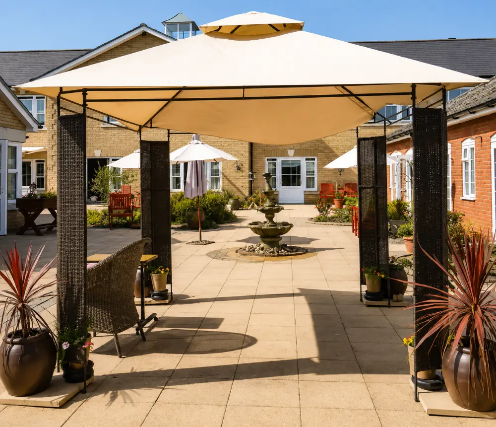 Courtyard garden with gazebo at Barking Hall Nursing Home in Barking, Suffolk
