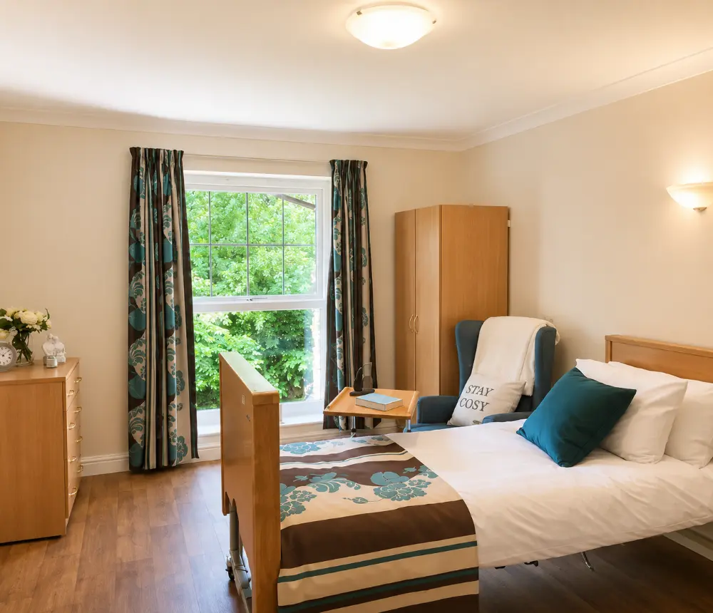 Comfortable bedroom at Blandford Grange Care Home in Blandford Forum, Dorset