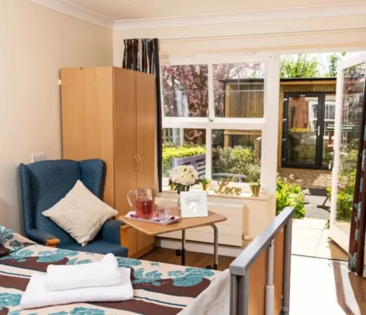 Ground floor bedroom with garden access at Blandford Grange nursing home in Blandford Forum