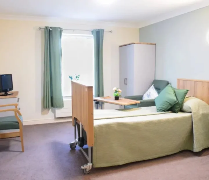 Comfortable resident bedroom at Cedar Court nursing home in Witney