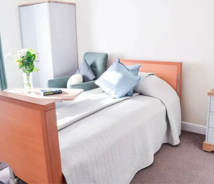 Bright resident bedroom at Cedar Court nursing home in Witney