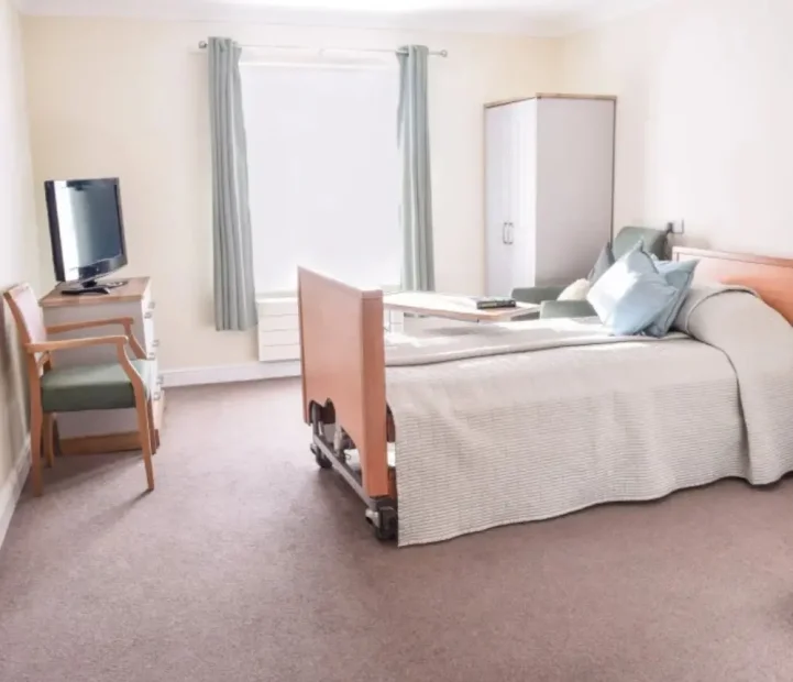 Spacious resident bedroom at Cedar Court nursing home in Witney