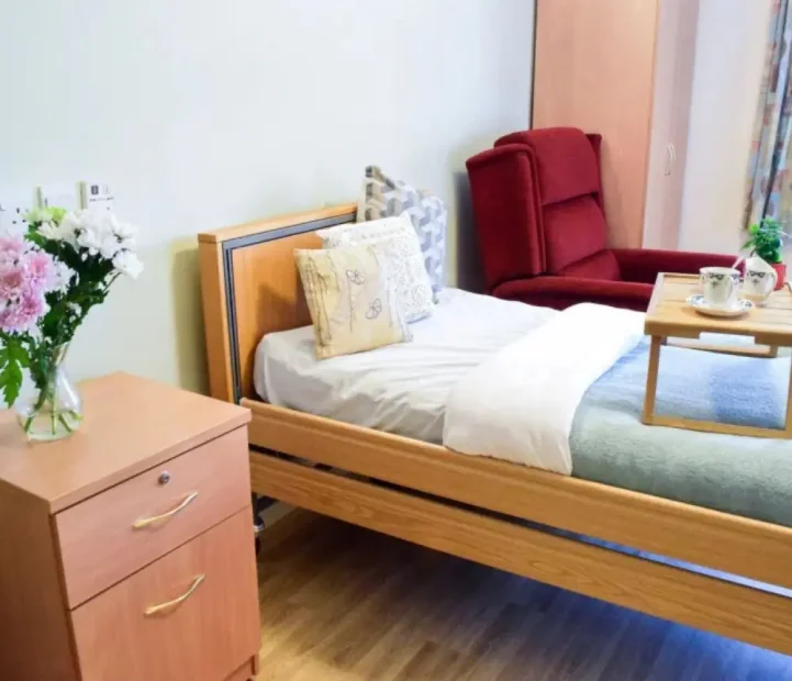 Cosy resident bedroom at Cedar Court nursing home in Witney