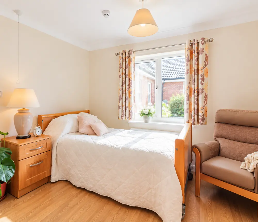 Bright bedroom at Claremont House nursing home in Caister-on-Sea