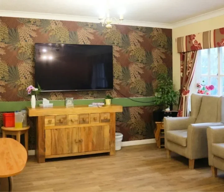 Modern communal lounge at Ladymead Nursing Home in Swindon