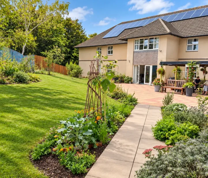 Landscaped garden and patio at Oaktree care home in Yate, Bristol