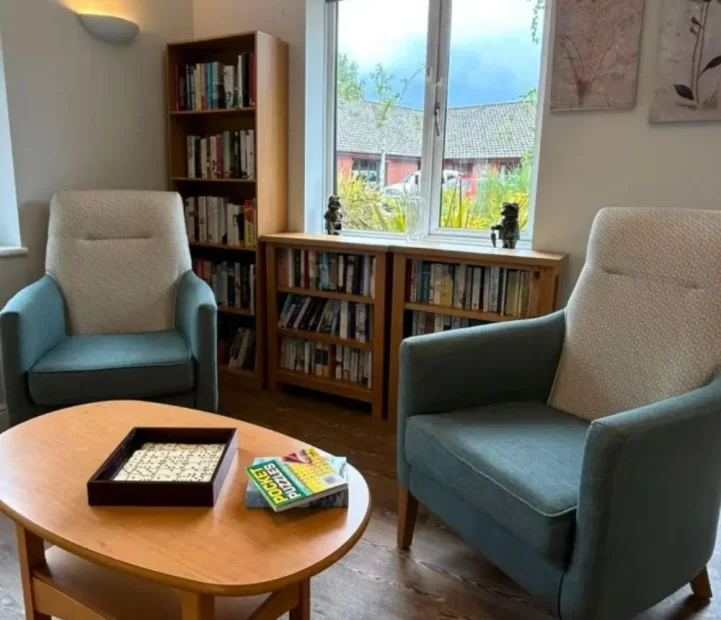 Comfortable communal lounge at Olive House care home in Newton Flotman
