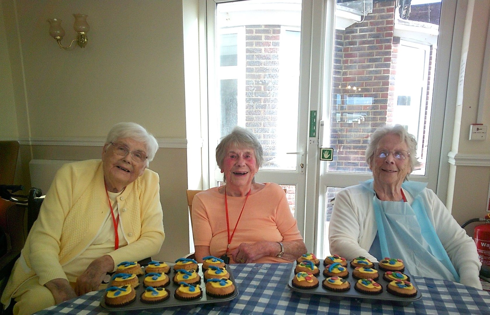 Residents with their baked cakes