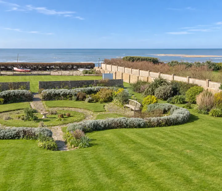 Sea views and landscaped gardens at Tenchley Manor residential and nursing care home.
