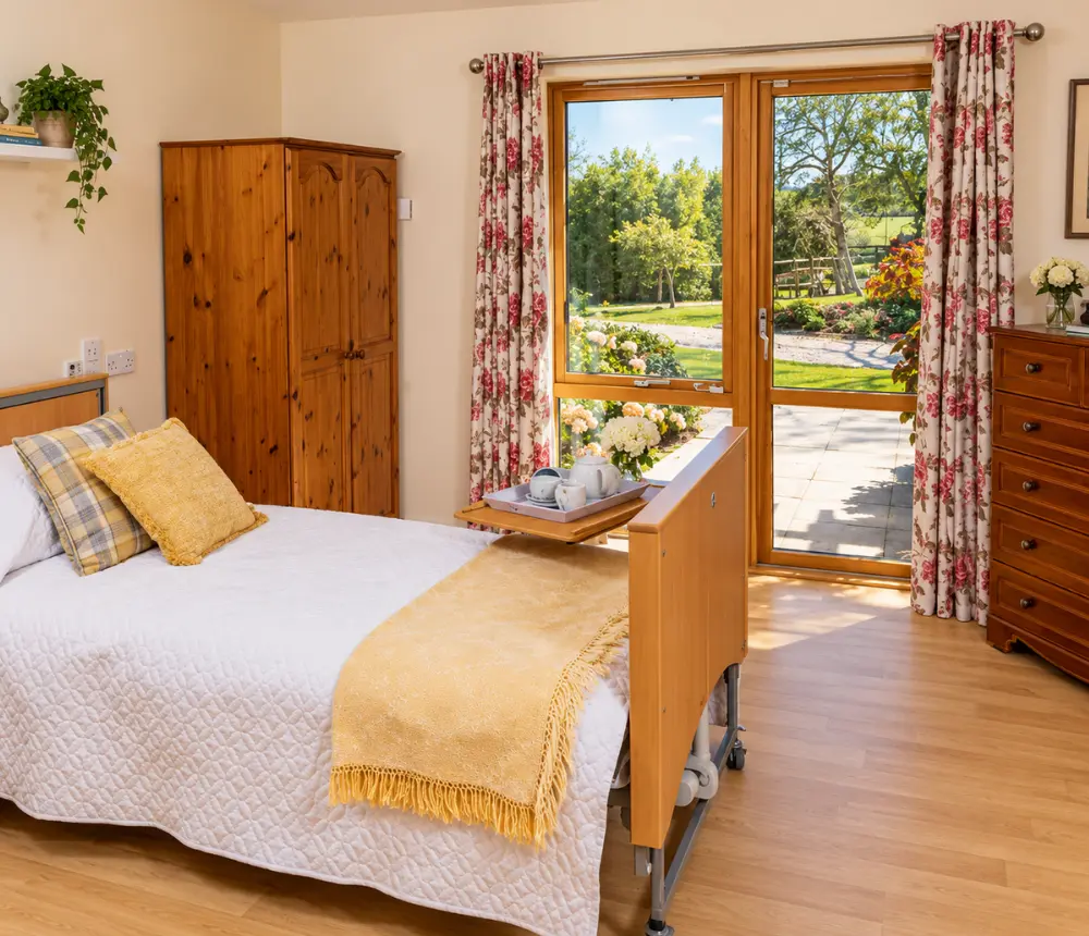Bedroom at The Old Vicarage residential care home in Sherborne, Dorset
