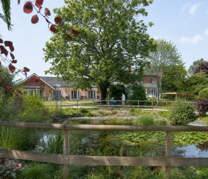 Garden pond at The Old Vicarage care home in Leigh, Sherborne, Dorset