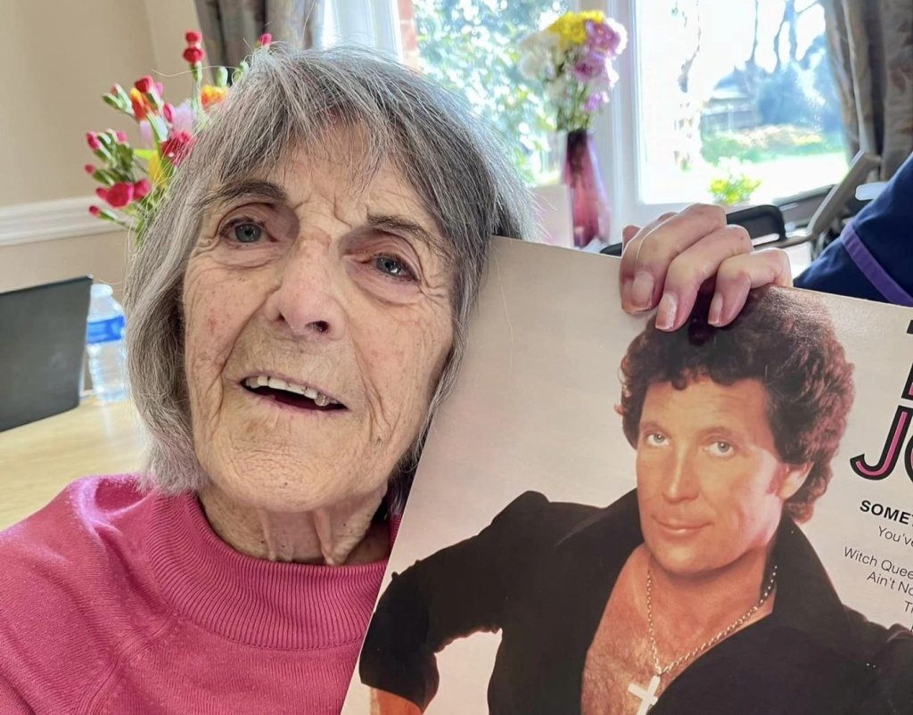 resident Mavis holding a Tom Jones vinyl