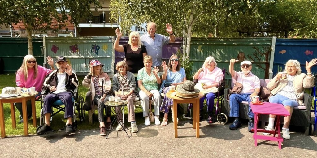 Residents, staff, and family members at Sovereign Lodge Care Home working together on the award-winning InBloom gardening project.