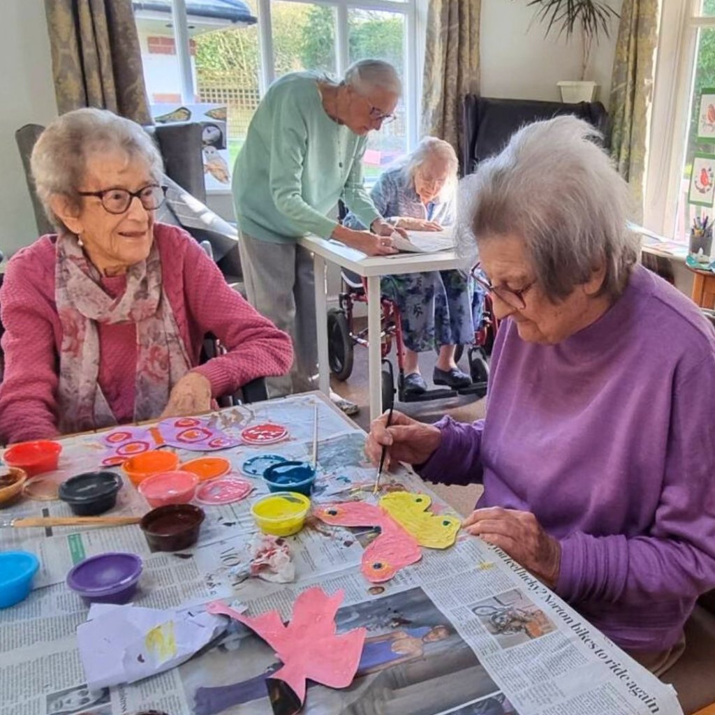 Aldringham Court residents creating a wildlife collage to celebrate World Wildlife Day.