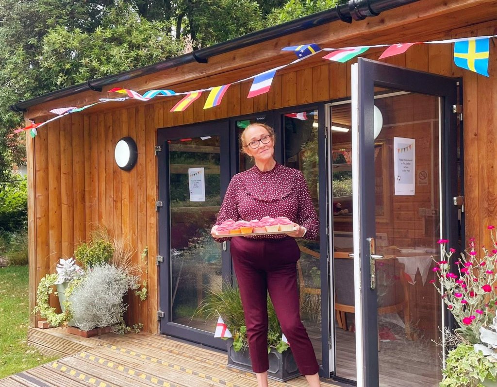 Rebecca Bewley, Home Manager at Foxgrove and Maynell House, with World Cup themed cakes