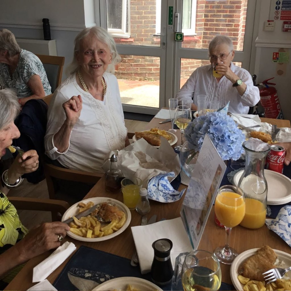 Residents from Albany Care Home and Tenchley Manor enjoying fish and chips during their seaside day in Selsey