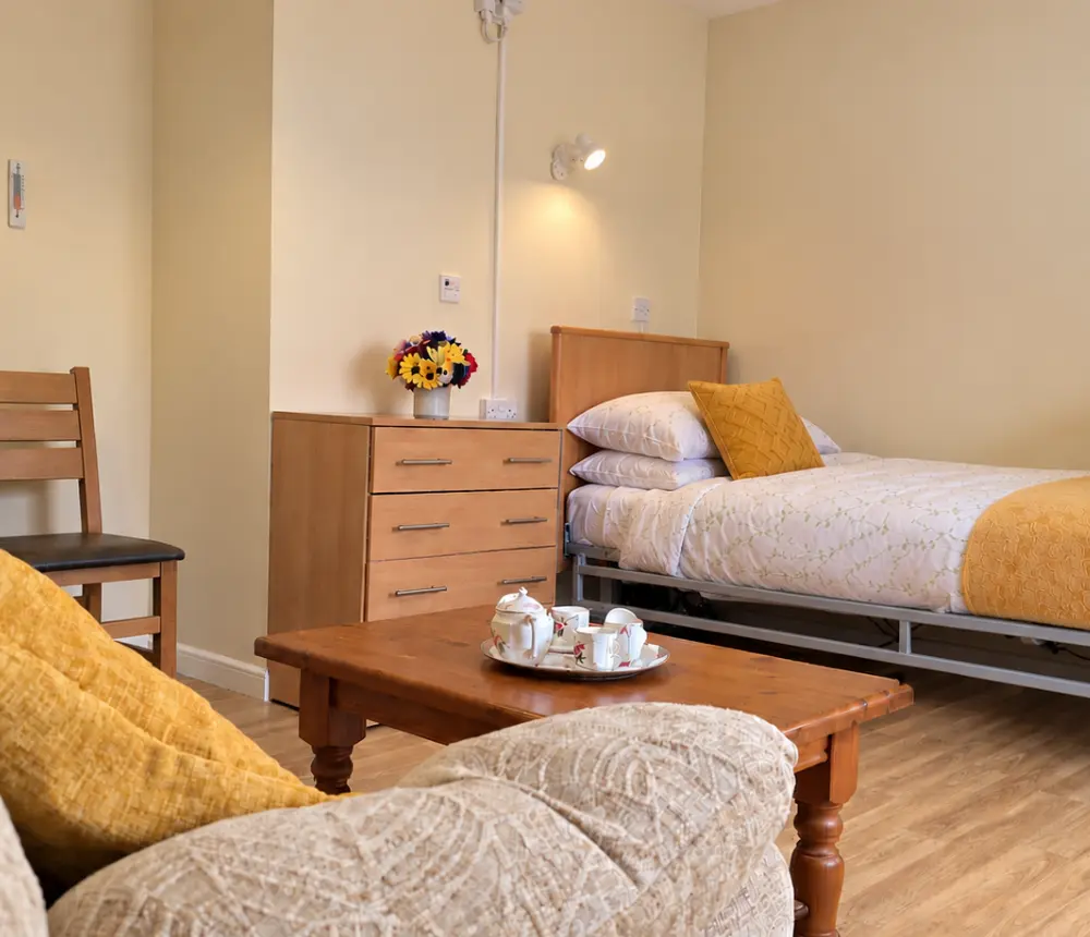 Comfortable bedroom at Ladymead nursing home in Swindon