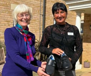 Bente Smith-Rewse and Handford House manager Agnieszka McDonald with specialist footwear